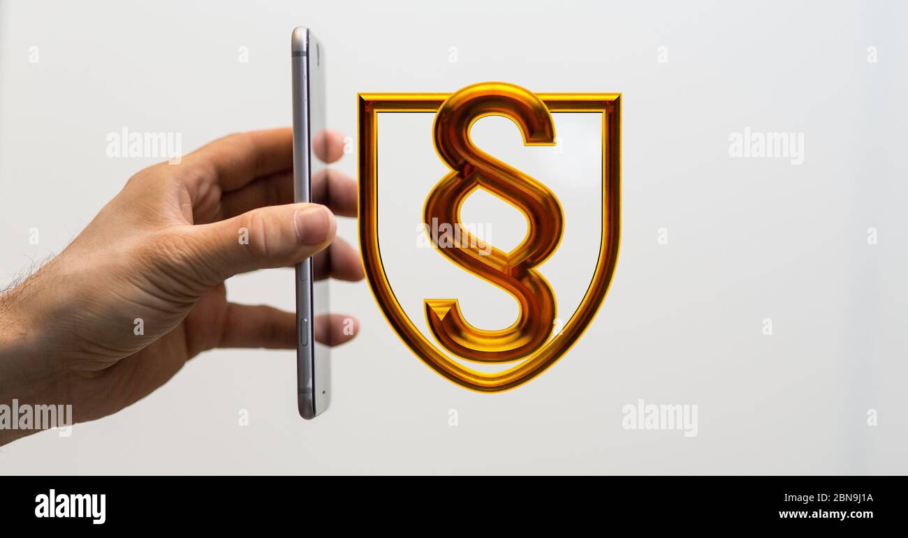 A paragraph law sign digital in hand Stock Photo