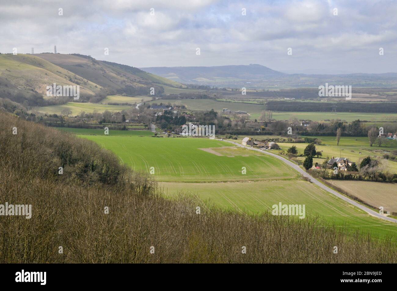 Sussex landscape in early spring seen from South Downs near Poynings village. Stock Photo