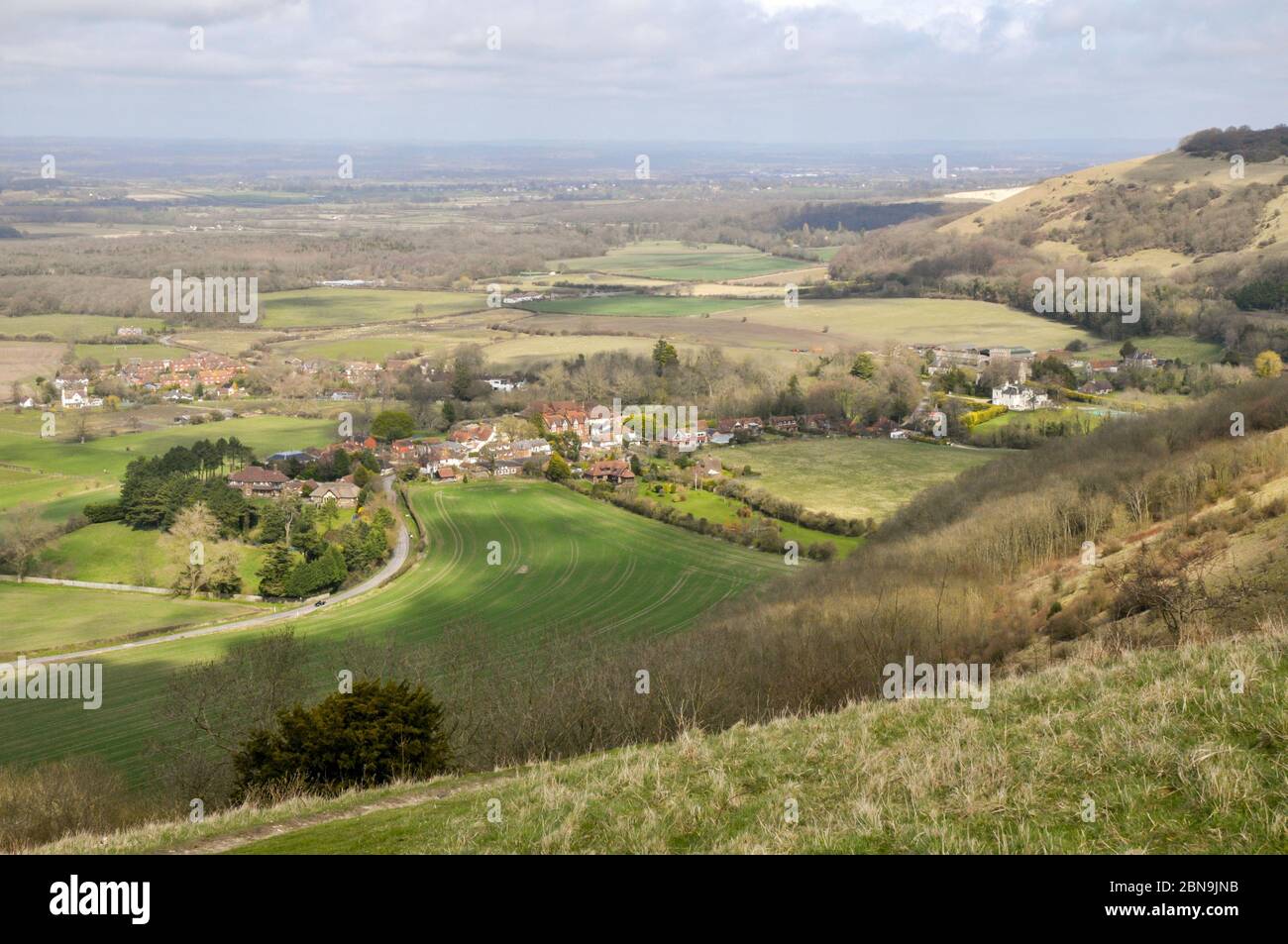 Landscape around Poynings village in early spring from high up a footpath on the South Downs near Devil's Dyke, West Sussex, England. Stock Photo