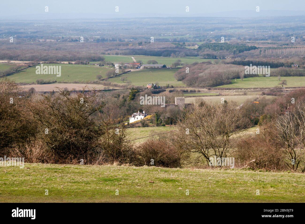 Sussex landscape in early spring seen from South Downs near Poynings village. Stock Photo