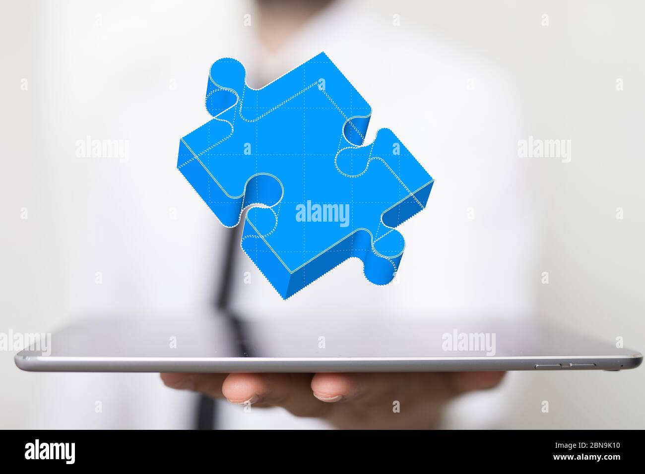 Hand businessman connecting jigsaw hi-res stock photography and images ...