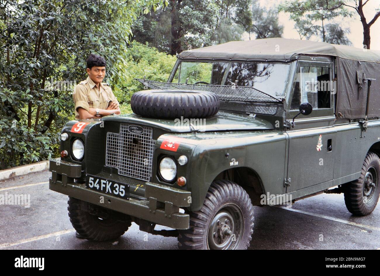 1973 - Gurkha Soldier and jeep near in Hong Kong ca. early 1970s Stock Photo