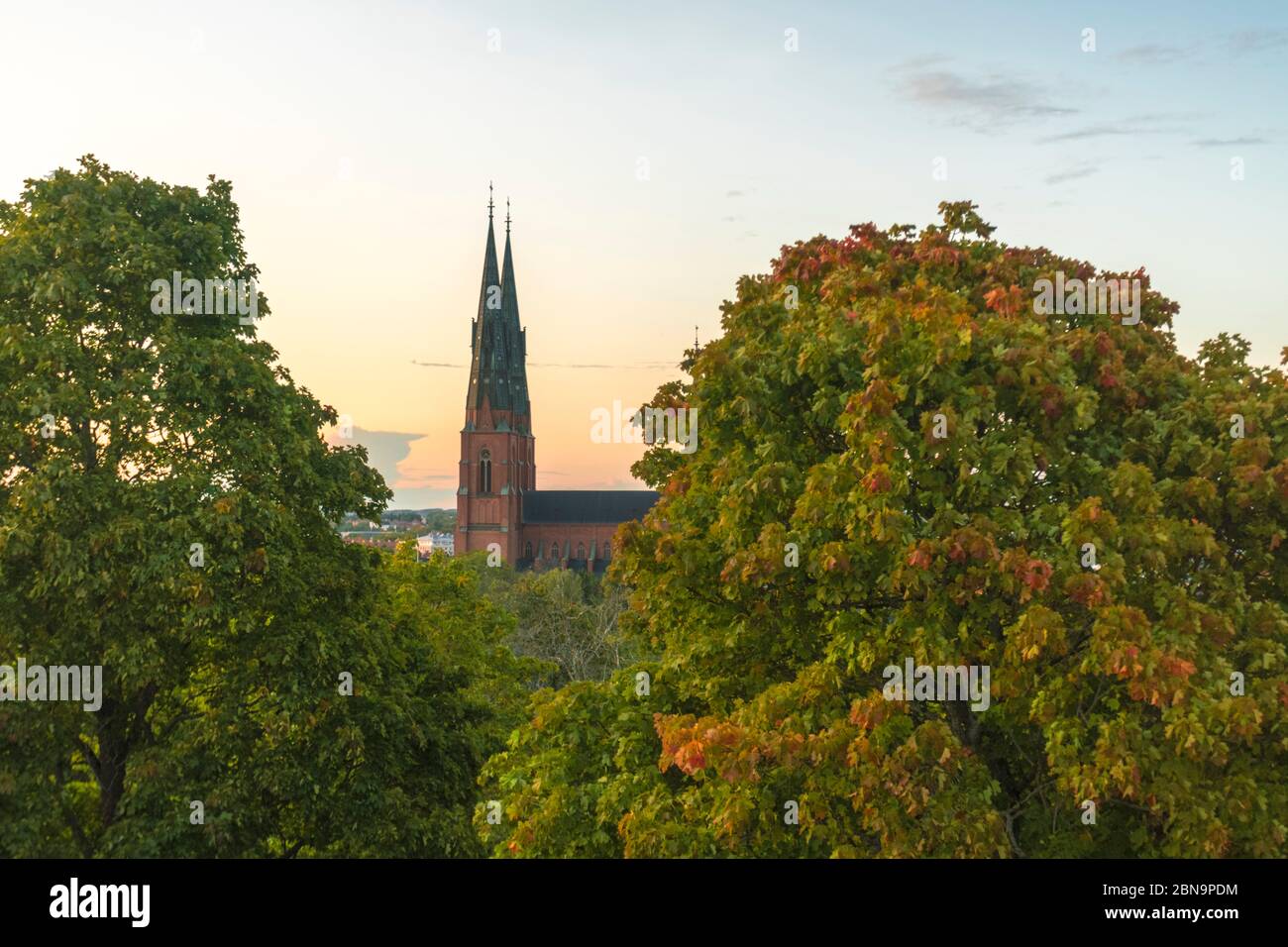 Uppsala Cathedral Uppsala domkyrka seen from the castle hill by sunset Stock Photo