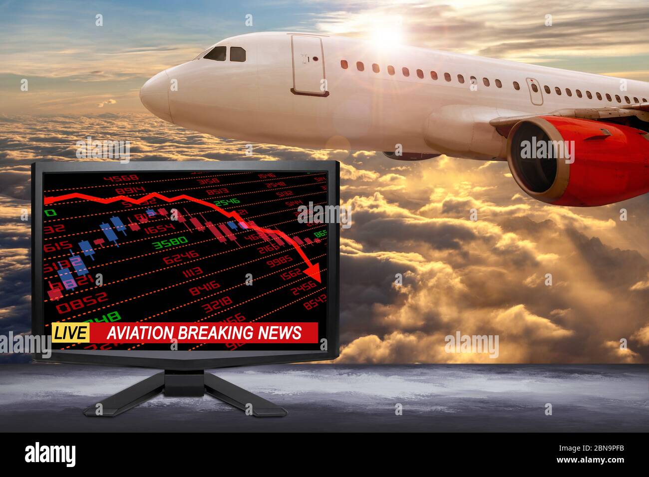 Live business breaking news update on TV screen with stock and financial indicators showing aviation and travel related industry in crisis due to Covi Stock Photo