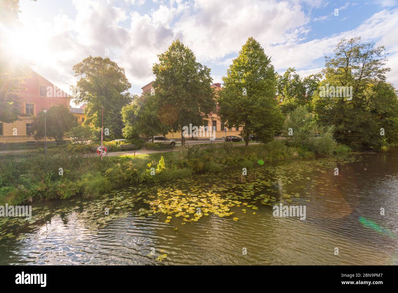 Fyris river in Uppsala downtown with beautiful green scenery in summer Stock Photo