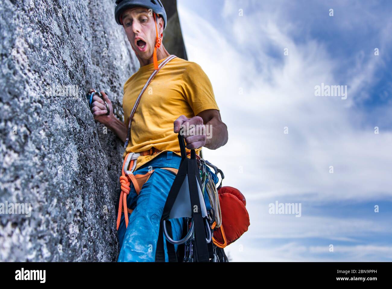 Climber holding portaledge on wall with funny face and open mouth Stock  Photo - Alamy