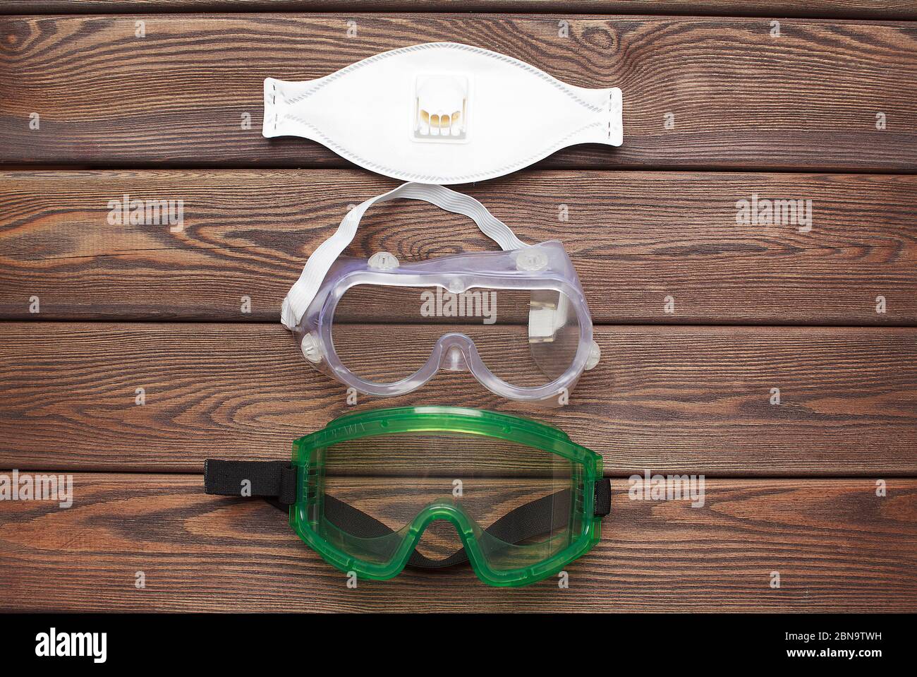 Basic material to protect yourself from the coronavirus mask, protective glasses Stock Photo