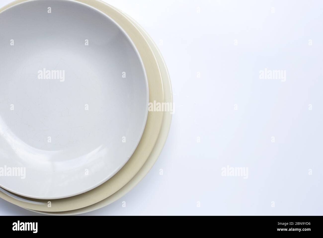 Top view of dishes on white background. Copy space Stock Photo - Alamy