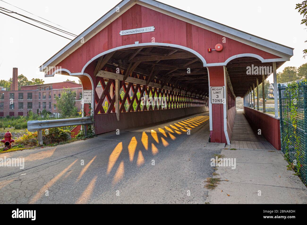 The Thompson Covered Bridge in West Swanzey, New Hampshire crosses the Ashuelot River Stock Photo