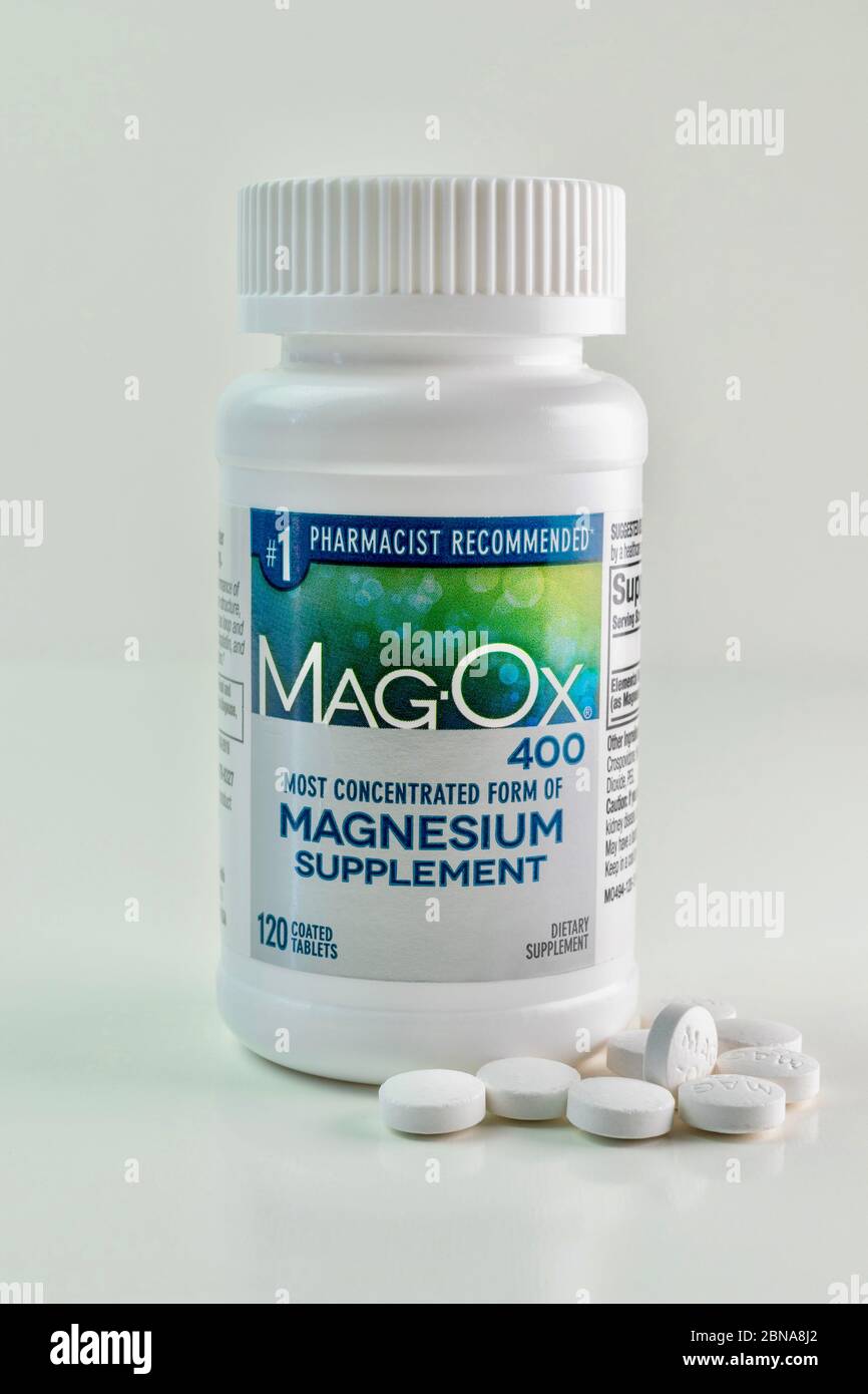 magnesium supplement bottle with pills Stock Photo Alamy