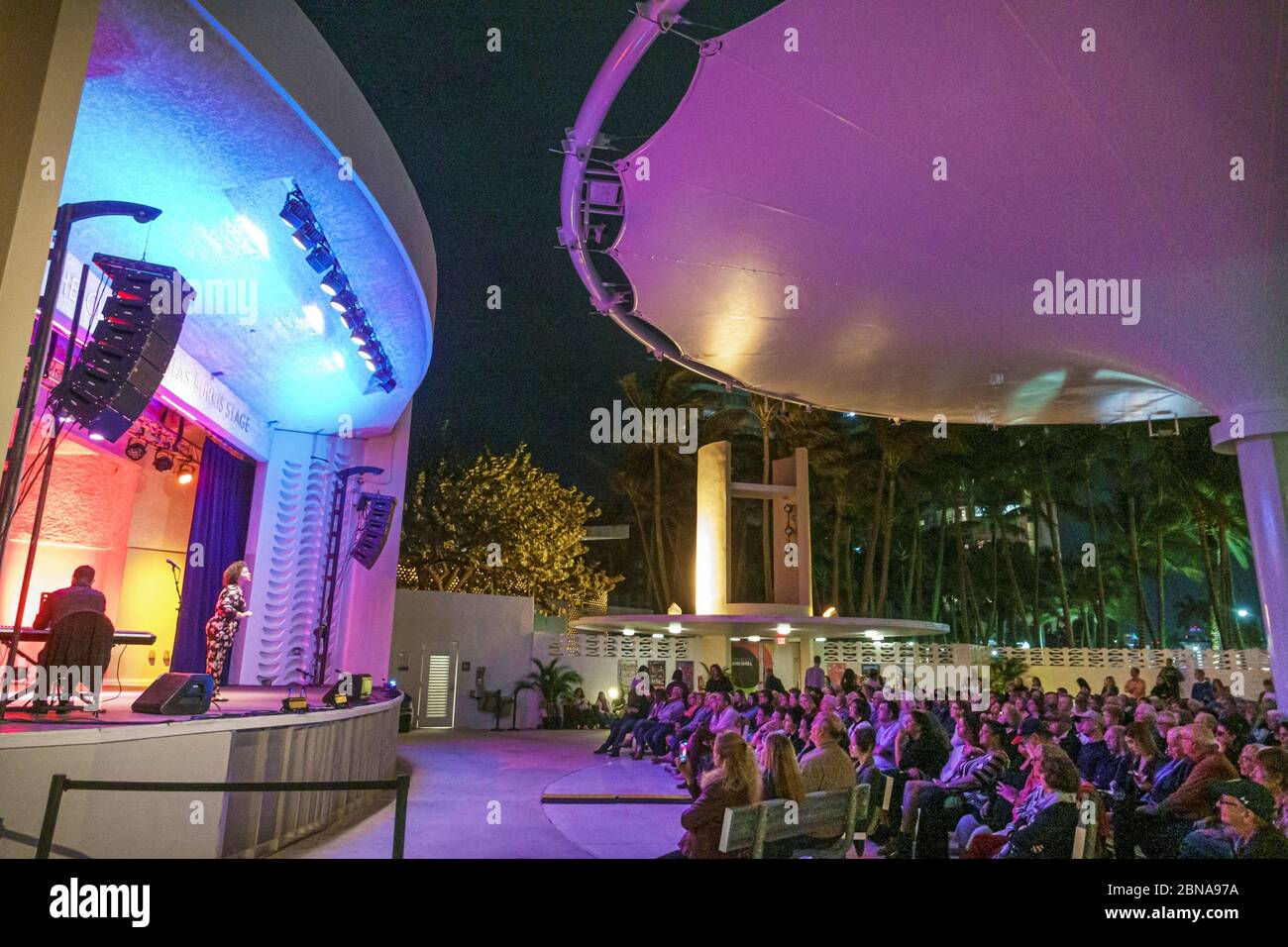 Miami Beach Florida,North Beach Band Shell audience,night,free opera performance,stage,singer performer performing,FL200217018 Stock Photo