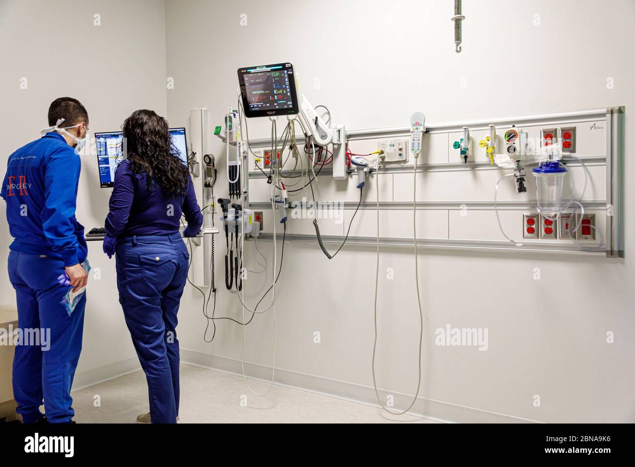 Miami Beach Florida,Mount Mt. Sinai Medical Center centre hospital,emergency room department,technician paramedic,worker employee,equipment,telemetry, Stock Photo