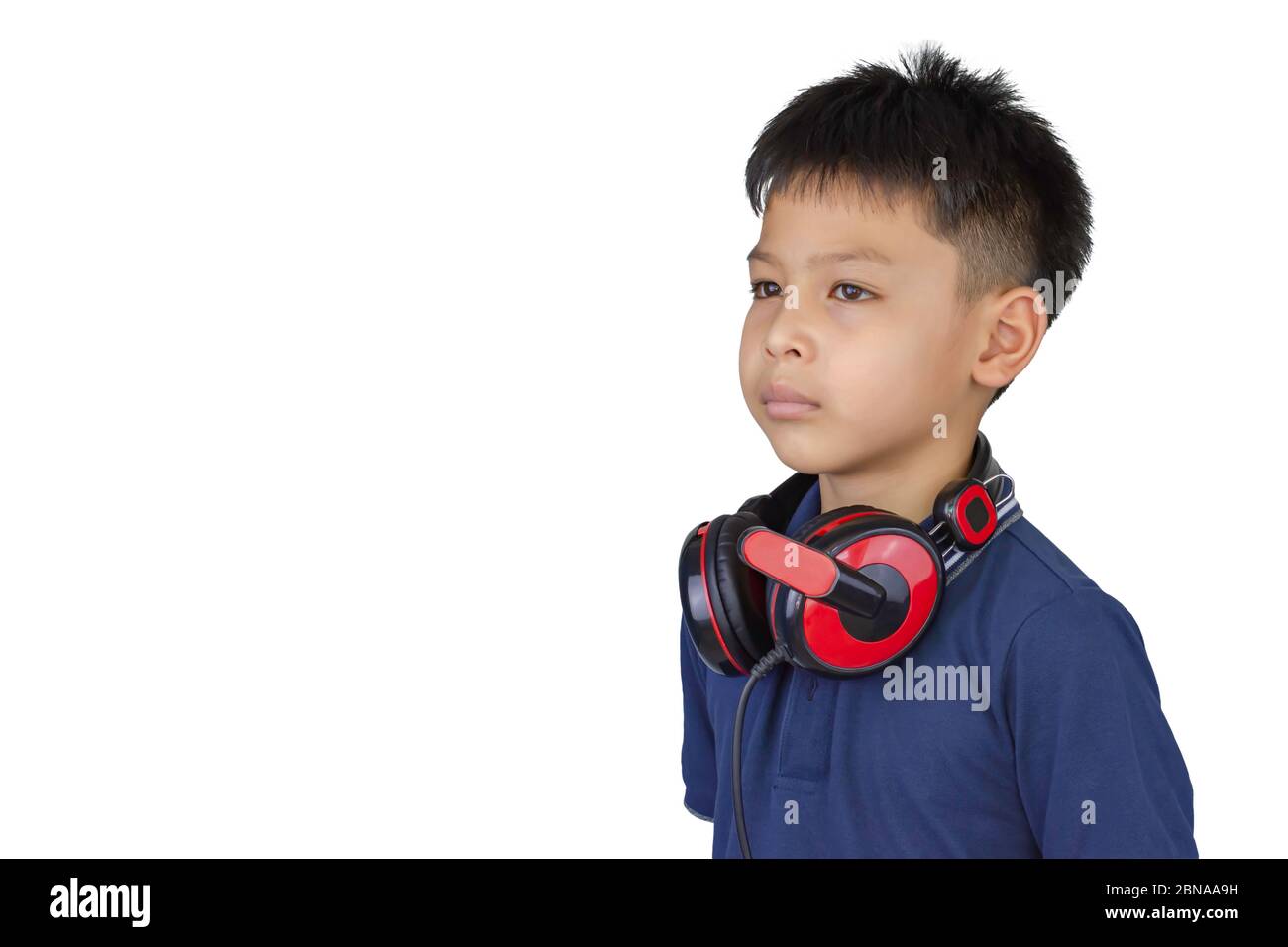 Isolated Portrait of Asian boy wearing headphones on a white background with clipping path. Stock Photo