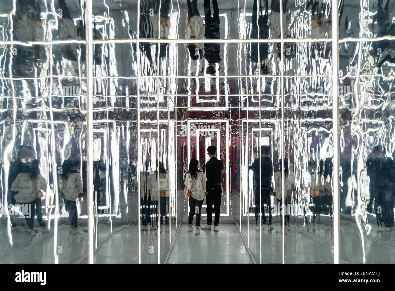 Shanghai, China. 13th May, 2020. May 13, 2020, Shanghai, into the nanjing road shopping mall of the star art museum, a number of cool installation scene dazzle. The exhibition hall USES a large number of mirror devices, combined with the arrangement of sound and light, to create stunning visual scenes and spatial effects, attracting many young people to punch in and take photos.(EDITORIAL USE ONLY. CHINA OUT) .It is understood that the whole sky museum covers an area of more than 500 square meters, a total of more than ten scenes, including breathing forest, super Credit: ZUMA Press, Inc./Alam Stock Photo