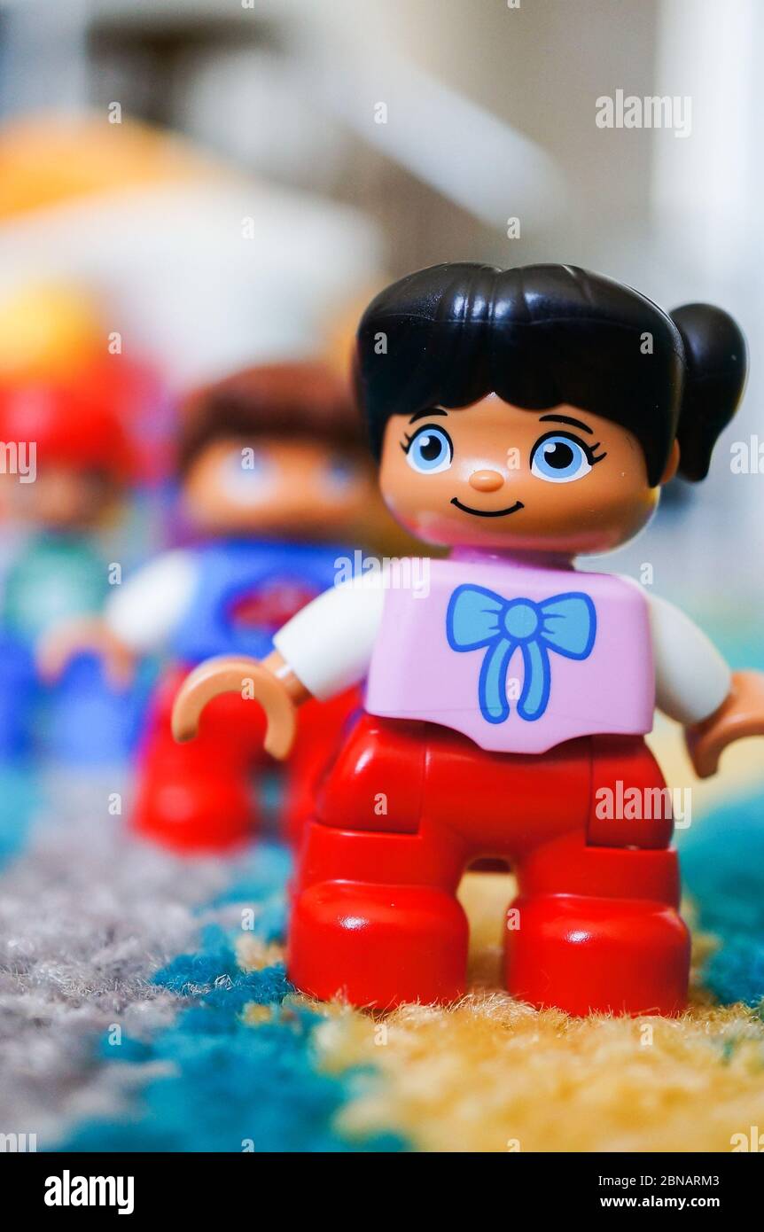POZNAN, POLAND - Apr 23, 2015: Lego Duplo toy girl figurine standing on a  carpet in soft focus background Stock Photo - Alamy