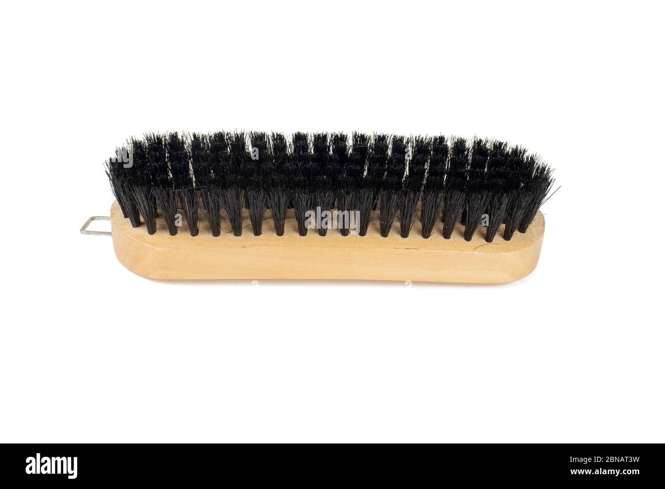 Wooden clothes and shoe brush with black bristle isolated on white background Stock Photo