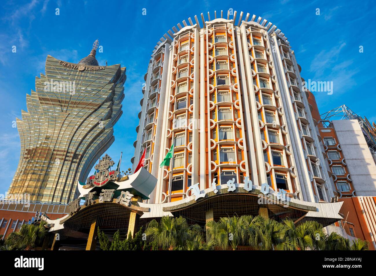 Buildings of the two casino hotels – The Grand Lisboa Hotel (left) and The Lisboa Hotel (right). Macau, China. Stock Photo