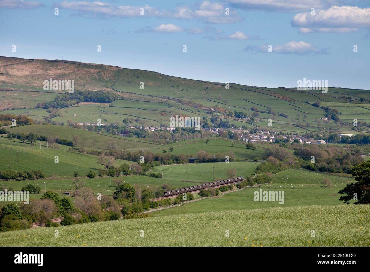 Freightliner merry go round coal train passing through the Yorkshire dales in wet Yorkshire passing Gargrave Stock Photo