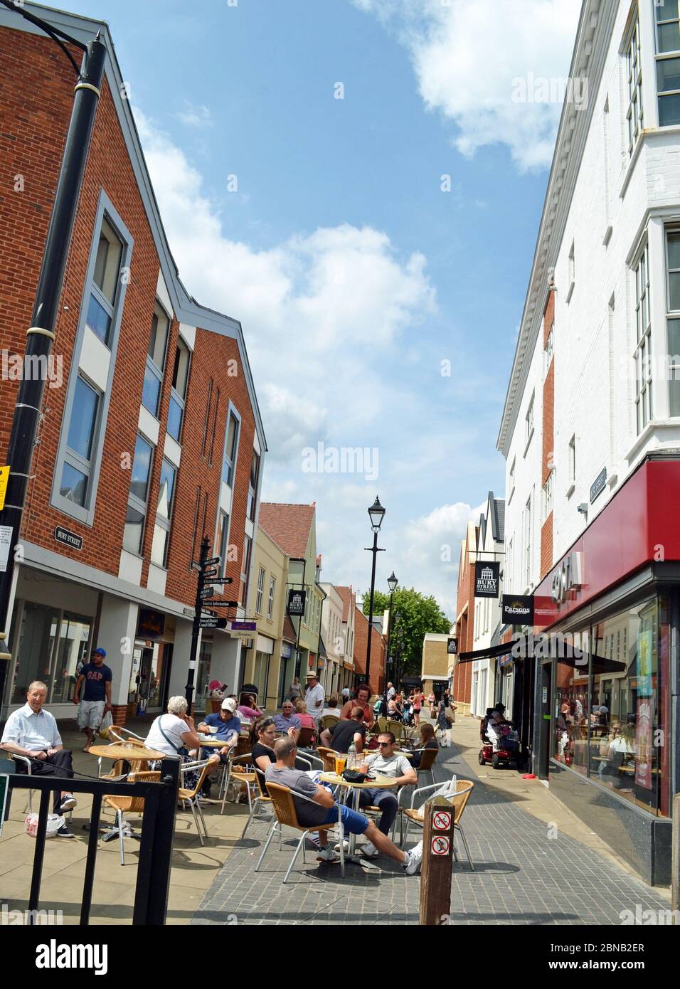 People outside a coffee shop or cafe in Abingdon town centre, Oxfordshire, UK Stock Photo