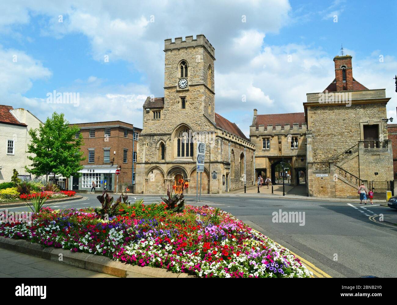 Flowers in front of a church in Abingdon town centre, Oxfordshire, UK Stock Photo
