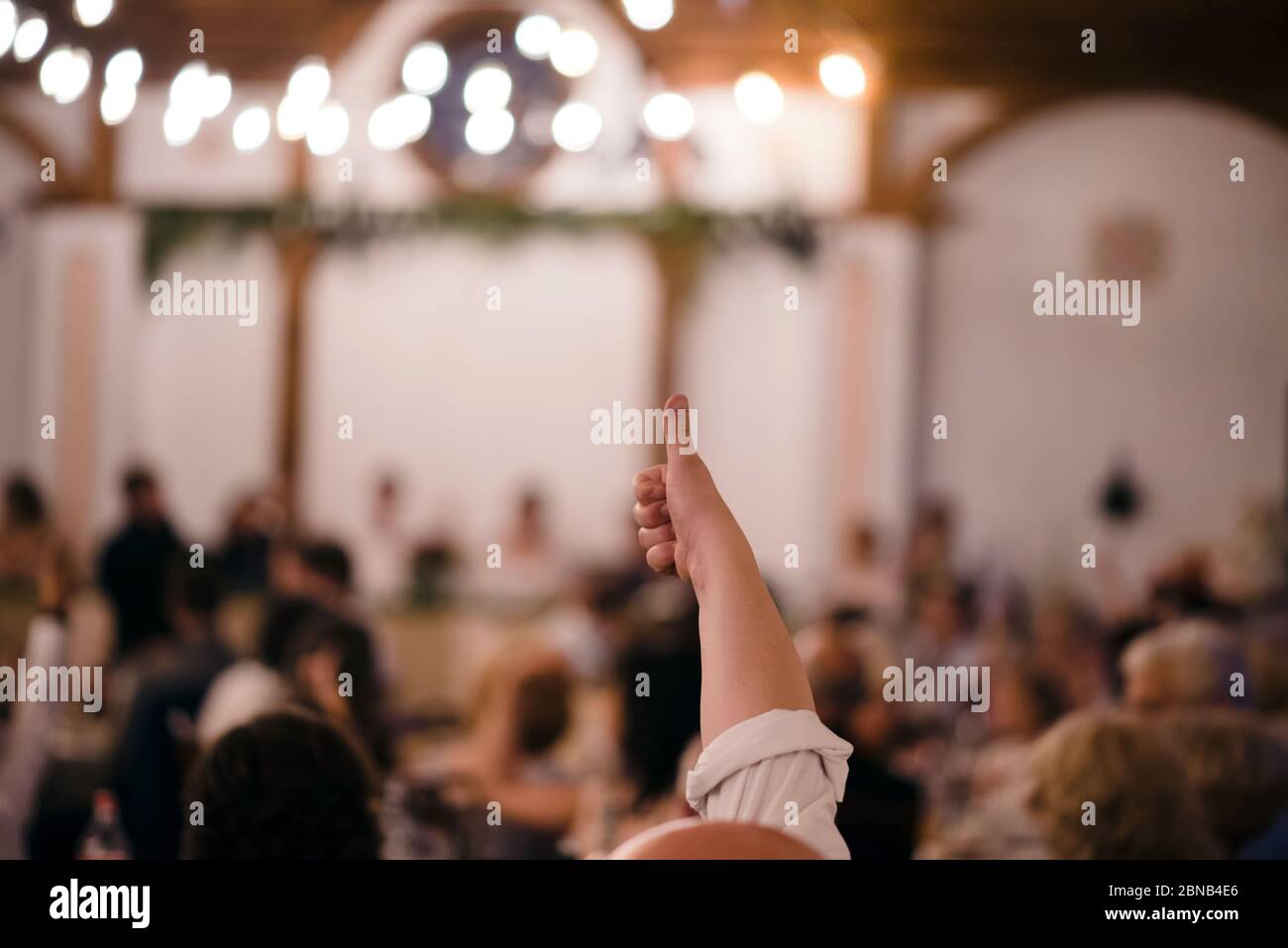 Male big thumb up against blurred background with copy space Stock Photo