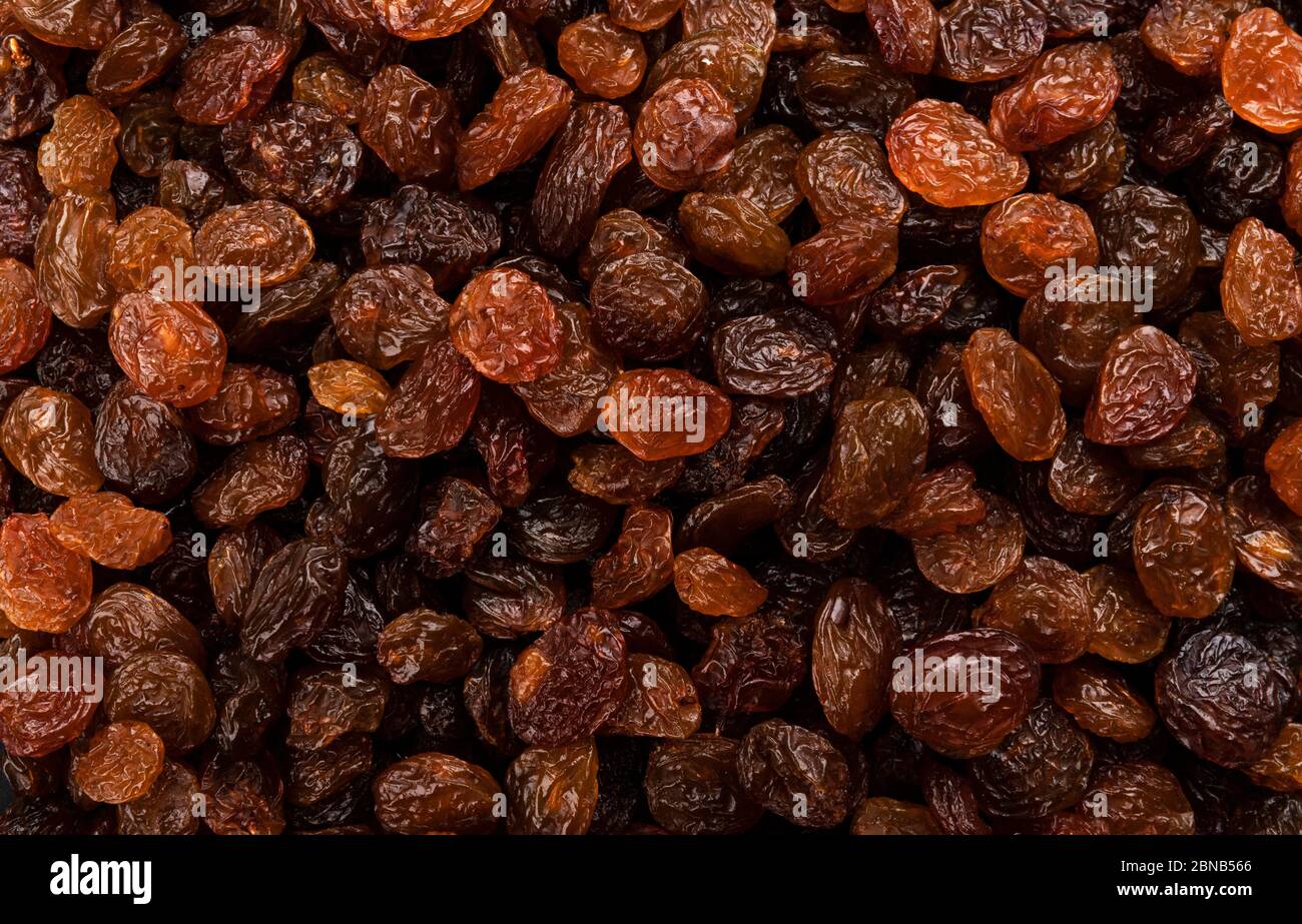 Raisins texture or background, top view close-up Stock Photo