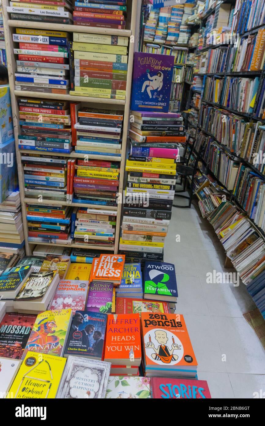 Books placed in the shelves in a book store located in Church Street in Bangalore (India Stock