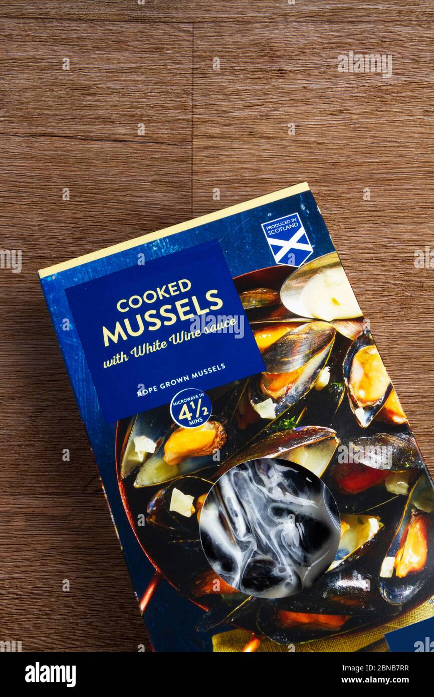 Boxed cooked mussels Stock Photo