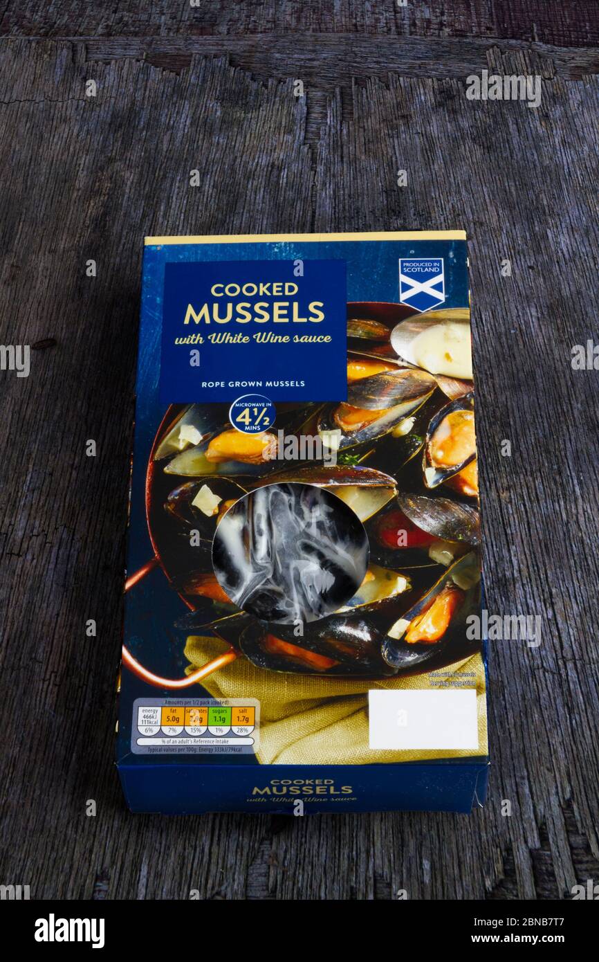 Boxed cooked mussels Stock Photo