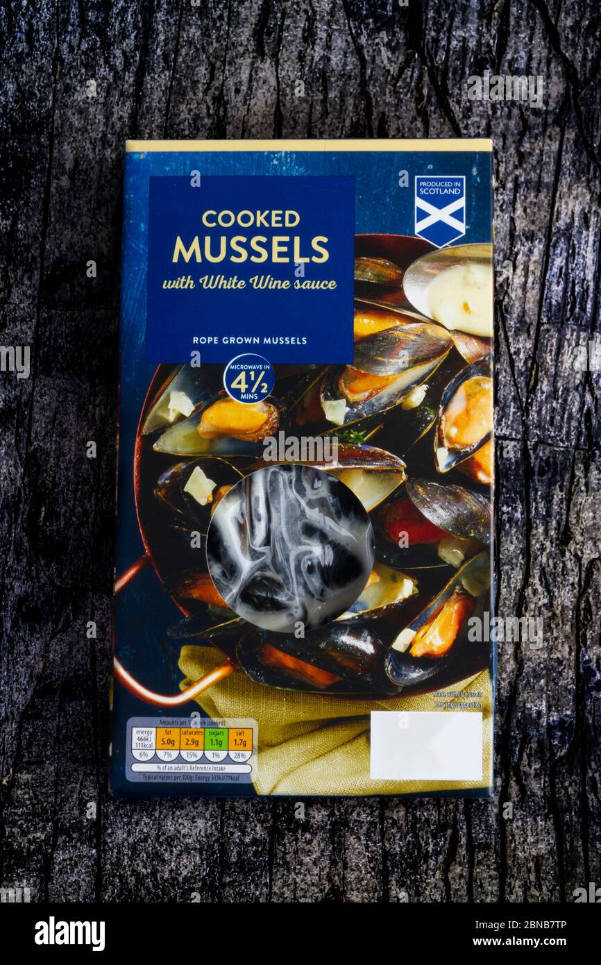 Boxed cooked mussels Stock Photo