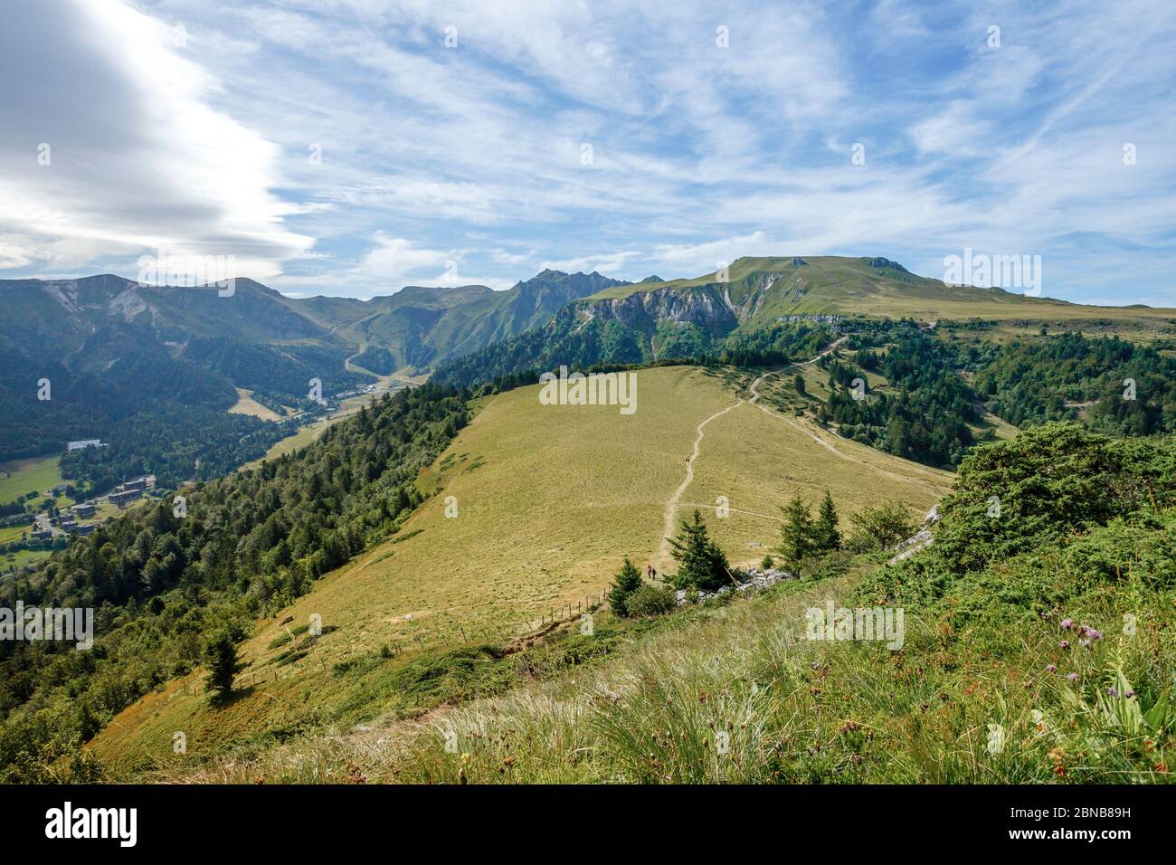 France, Puy de Dome, Volcans d’Auvergne Regional Natural Park, Mont Dore, view from the top of Le Capuchin with the Puy de Sancy in the background // Stock Photo