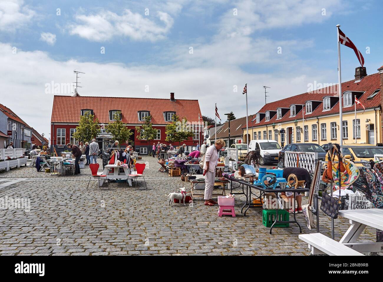 AAKIRKEBY, DENMARK - Jun 27, 2019: Aakirkeby, Bornholm island, Denmark - 27 June 2019. Local people trading goods in city market of Aakirkeby, Bornhol Stock Photo
