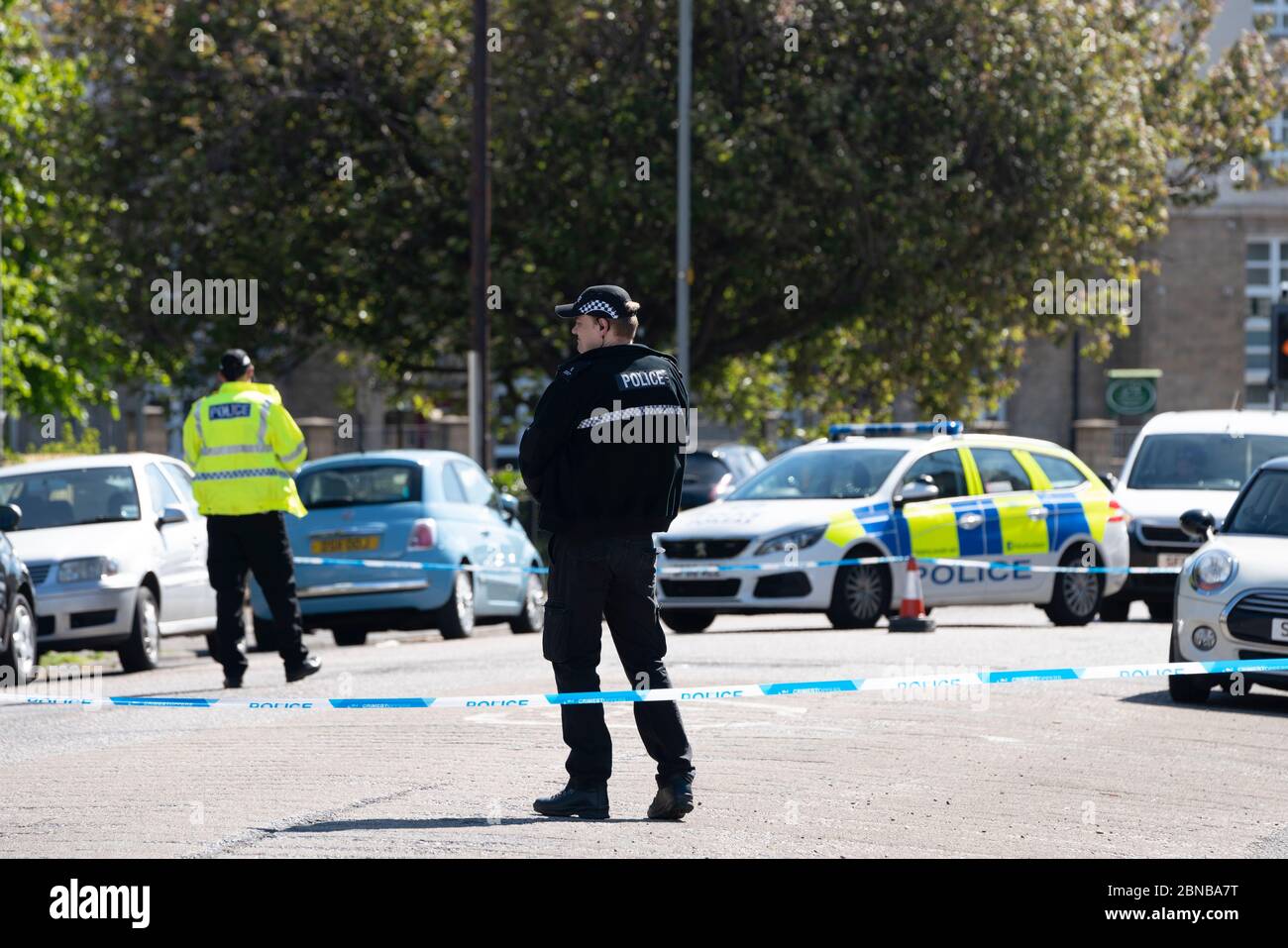 Edinburgh, Scotland, UK. 14 May 2020. Police and forensic team attend a