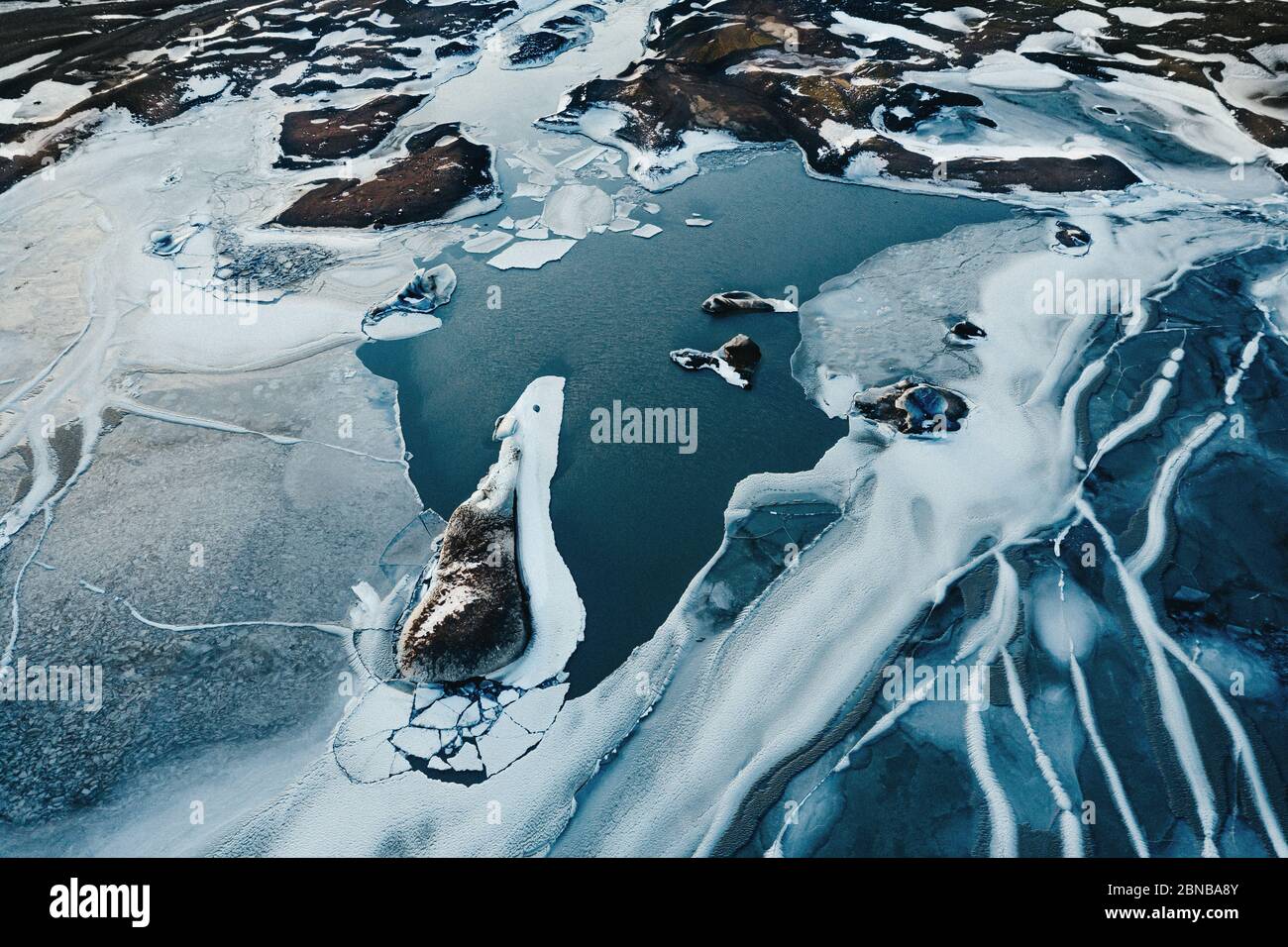 Aerial drone top view glacier iceland Sólheimajökull, Melting Ice, Climate Change and Global Warming Concept Stock Photo