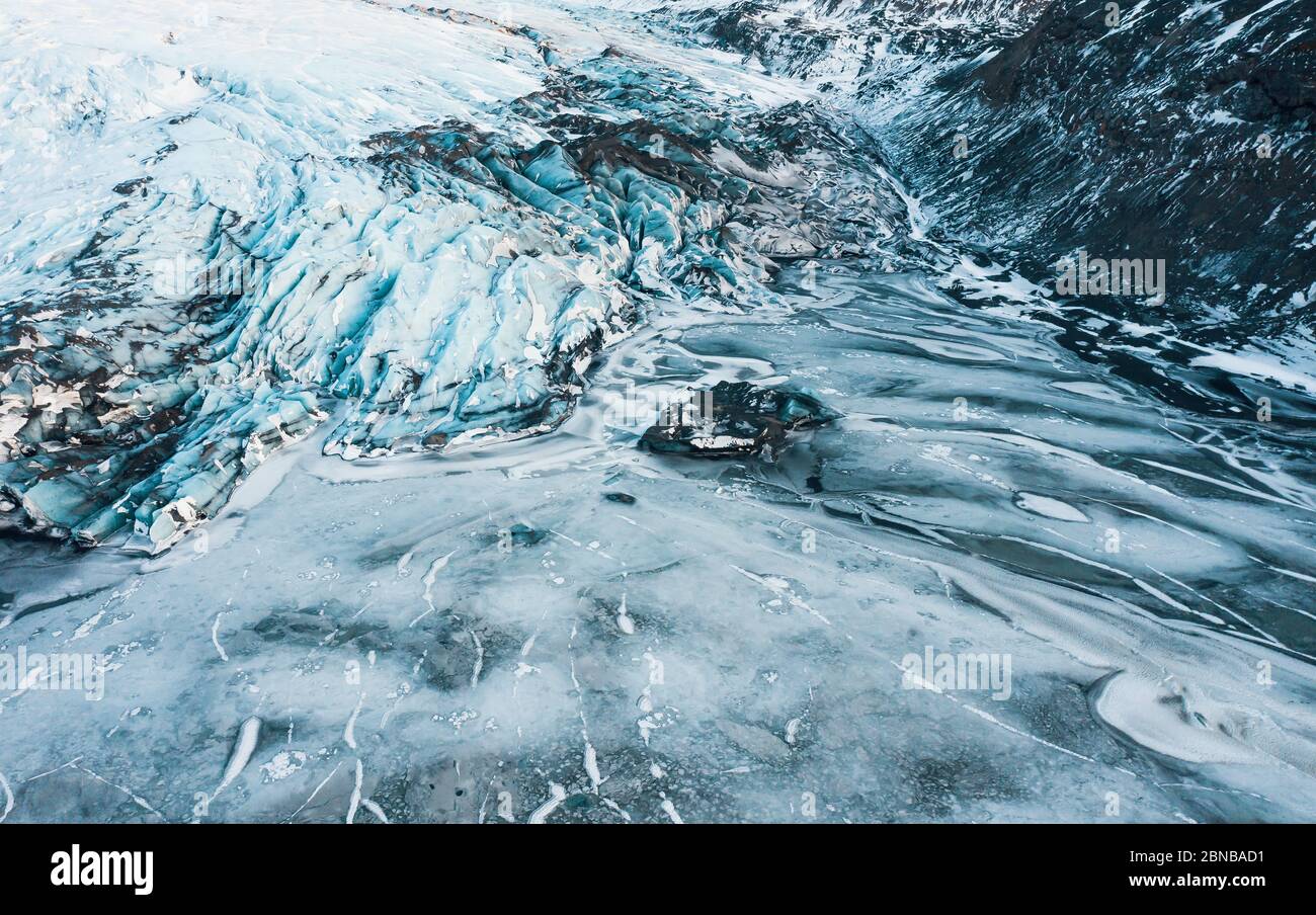 Aerial drone top view glacier iceland Sólheimajökull, Melting Ice, Climate Change and Global Warming Concept Stock Photo