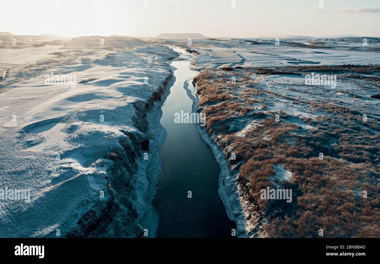 Aerial view of a river in Iceland with turquoise water, Melting Ice, Climate Change and Global Warming Concept Stock Photo
