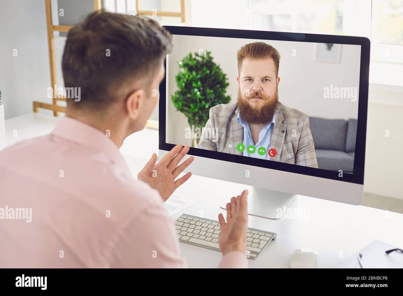 Online work training education video chat call webcam conference. Male  coach says business course video conferencing online webcam chat using  computer Stock Photo - Alamy