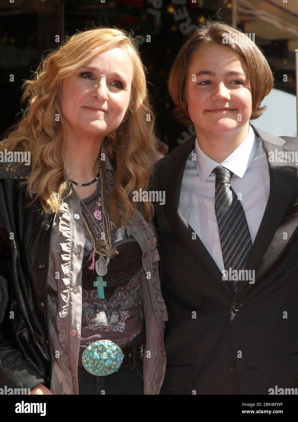 13 May 2020 - Beckett Cypher, Melissa Etheridge's son with her former partner Julie Cypher, has died of causes related to opioid addiction, at age 21. Cypher was born to Melissa Etheridge and filmmaker Julie Cypher in November 1998. The couple had another child, a daughter, Bailey Jean, 23, who was born in February 1997. The sperm for the Beckett and Bailey Jean Cypheridge was donated by music legend David Crosby. Cypher and Melissa Etheridge split in September 2000. File photo: 27 September 2011 - Hollywood, California - Melissa Etheridge with her Children and Mother. Melissa Etheridge Honore Stock Photo