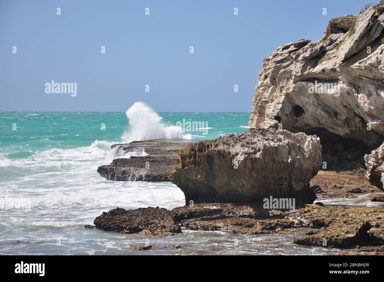 Rocky low-water path to entrance to 'Waenhuiskrans'cave near Arniston Western Cape. Stock Photo