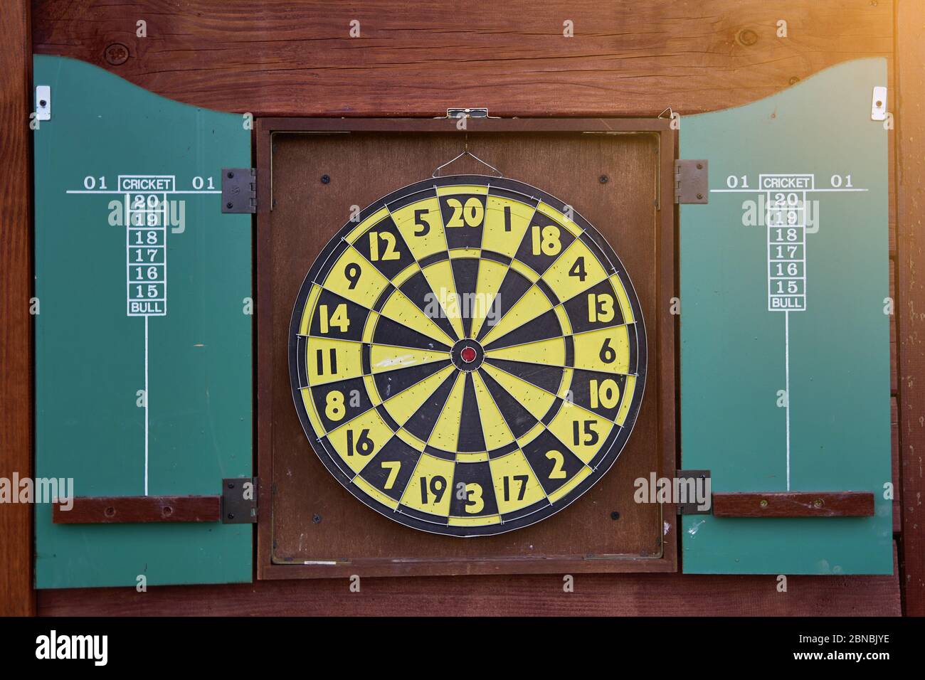 Darts game. round dartboard. Marketing concept. Close-up. Stock Photo