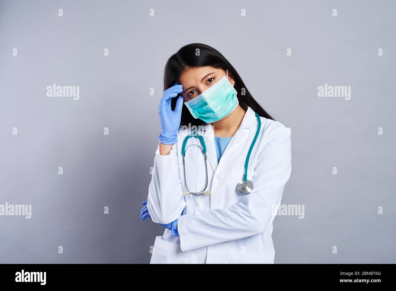 Doctor woman tired in hi-res stock photography and images - Alamy
