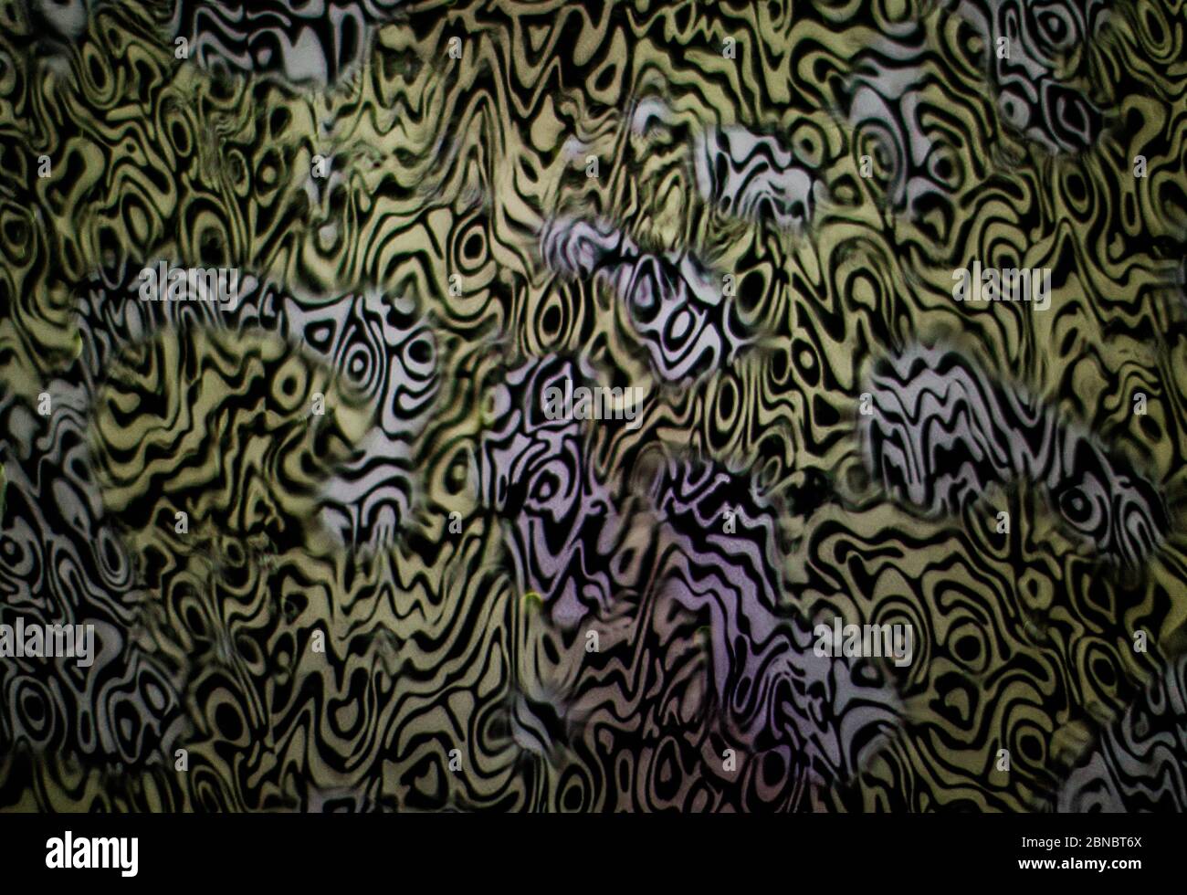 Closeup shot of water drops on graphic pattern background Stock Photo