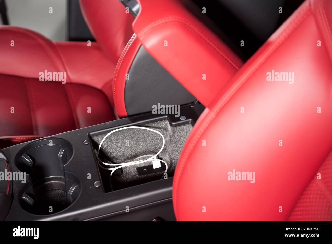 Beautiful red interior of a luxurious car with red and black details ...