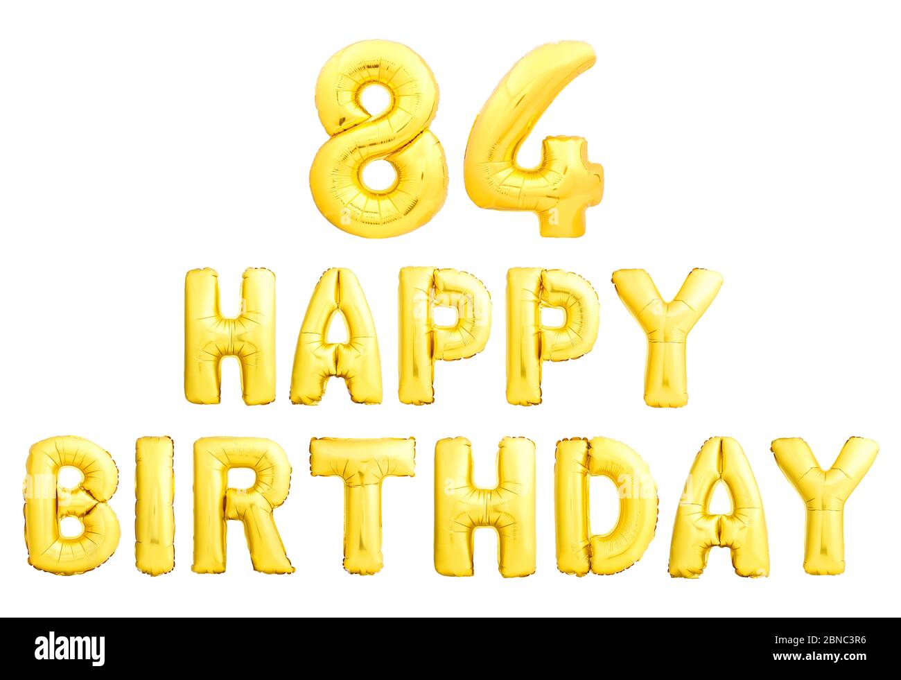 Happy birthday 84 years golden inflatable balloons isolated on white background Stock Photo