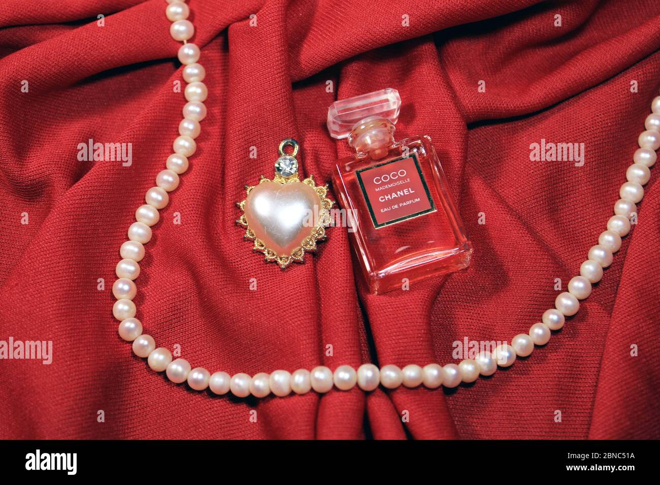 Kolkata, India on 13th May in 2020 : Chanel perfume bottles isolated on red  background. Different Chanel perfume products with female accessories Stock  Photo - Alamy