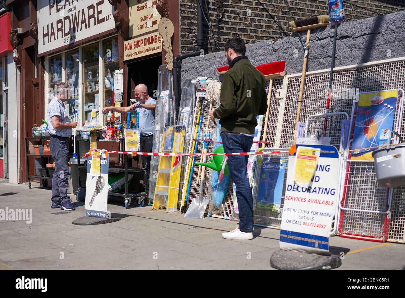 A hardware store trading under social distancing measures during the global coronavirus pandemic in Dublin city, Ireland. Stock Photo