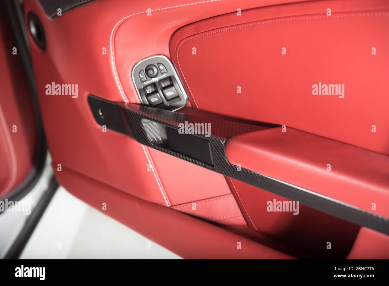 Beautiful red interior of a luxurious car with red and black details ...