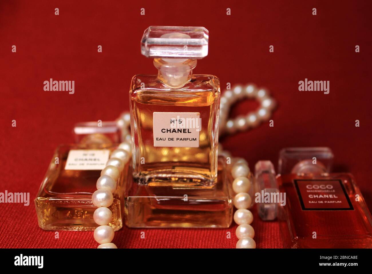 Kolkata, India on 13th May in 2020 : Chanel perfume bottle isolated on red  & blue background. Bottle with Coco Chanel perfume product Stock Photo -  Alamy
