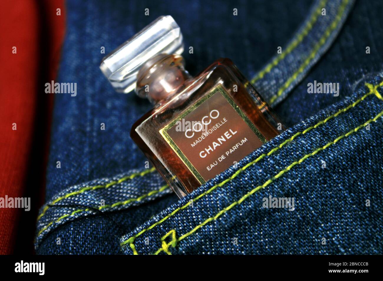 Paris, France on 13th May in 2020 : Chanel perfume bottles in a pocket of  blue jeans. French perfume Stock Photo - Alamy