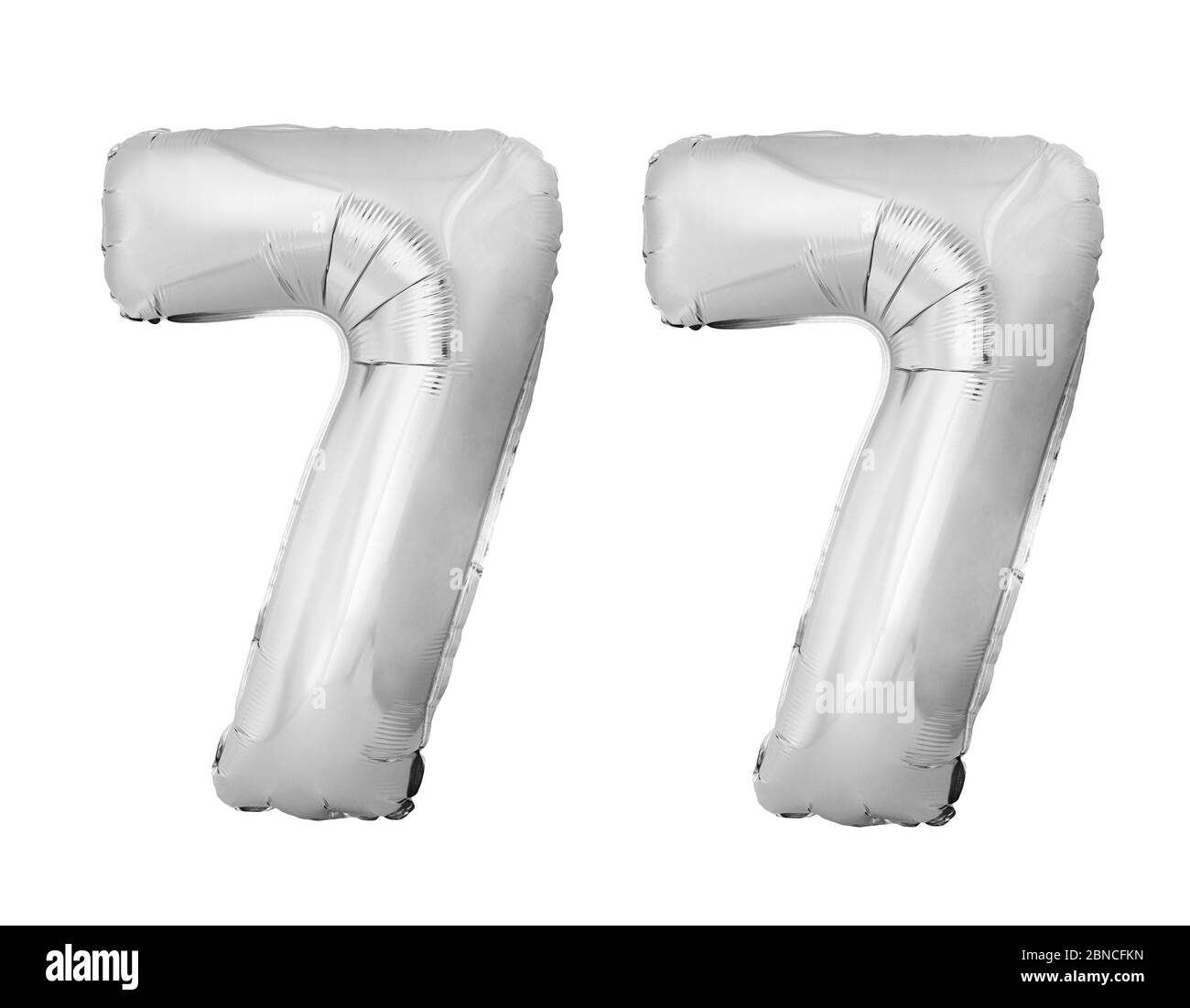 Number 77 seventy seven of silver inflatable balloons isolated on white  background Stock Photo - Alamy